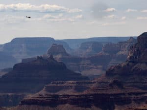 Lipan Point with helicopter in the distance